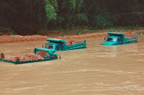 trucks in flood