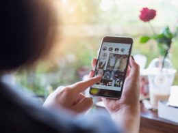 one girl checks the android instagram clone on mobile.