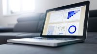 Laptop showing sales analytics dashboards