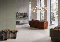 VitrA Tiles showroom interior with large-format tiles: At Cersaie Fair, VitrA Tiles Unveils Its "The Code" Concept Alongside New Codes for Design