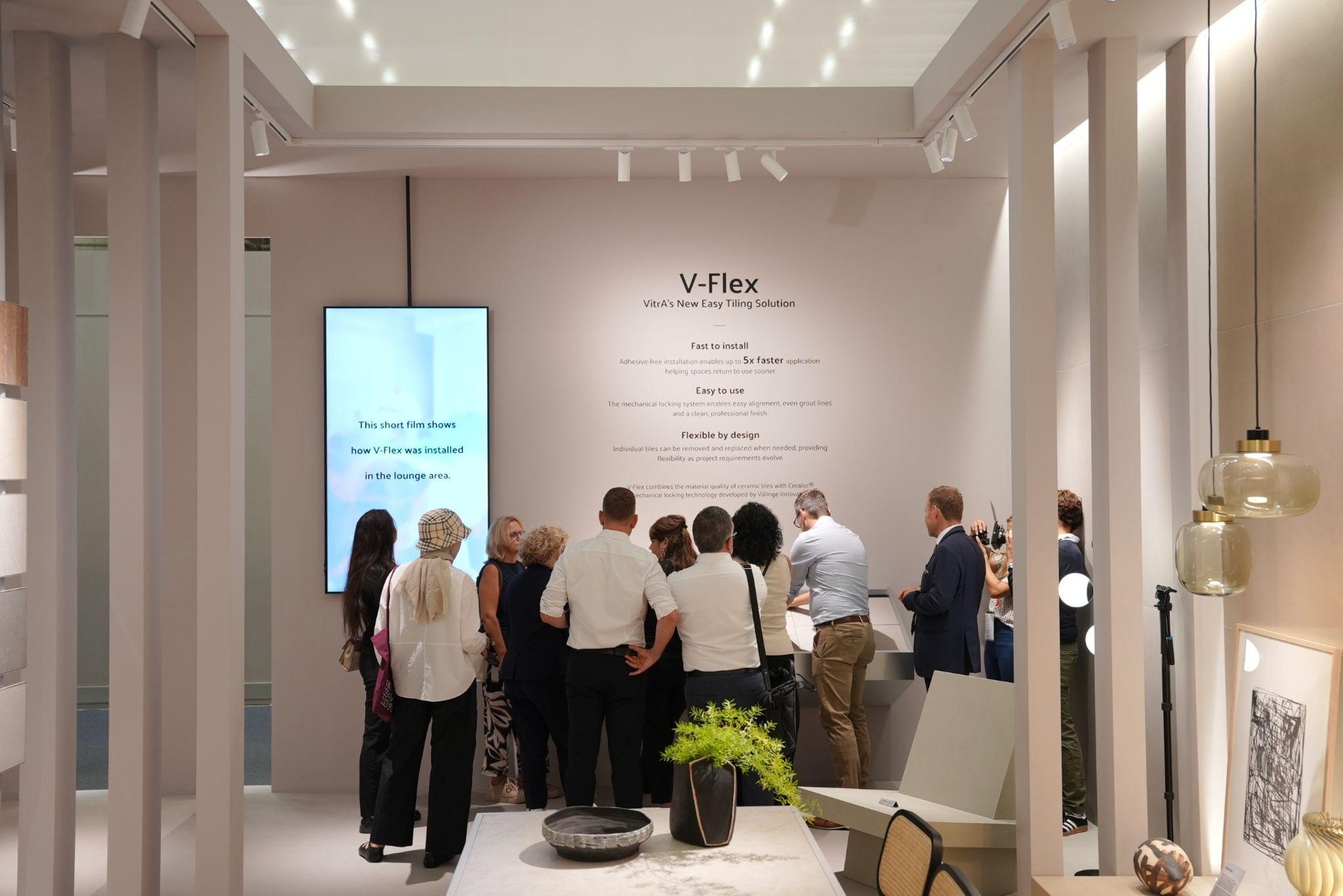 Visitors at the V-Flex installation display: At Cersaie Fair, VitrA Tiles Unveils Its "The Code" Concept Alongside New Codes for Design